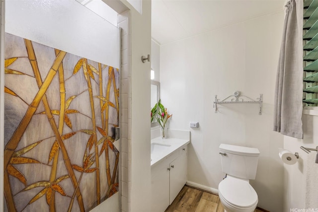 2168 Round Top Dr, Honolulu, HI 96822 - full bath with baseboards, wood finished floors, toilet, and vanity