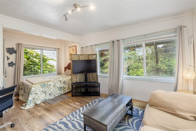 2168 Round Top Dr, Honolulu, HI 96822 - bedroom featuring wood finished floors