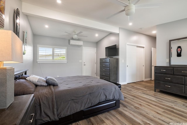 914 Lemiwai St, Wahiawa, HI 96786 - bedroom with a wall unit AC, wood finished floors, two closets, recessed lighting, and a ceiling fan