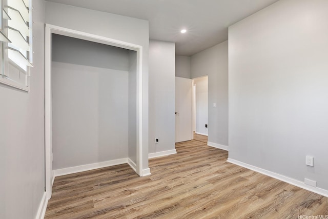 914 Lemiwai St, Wahiawa, HI 96786 - unfurnished bedroom featuring wood finished floors, recessed lighting, and a closet