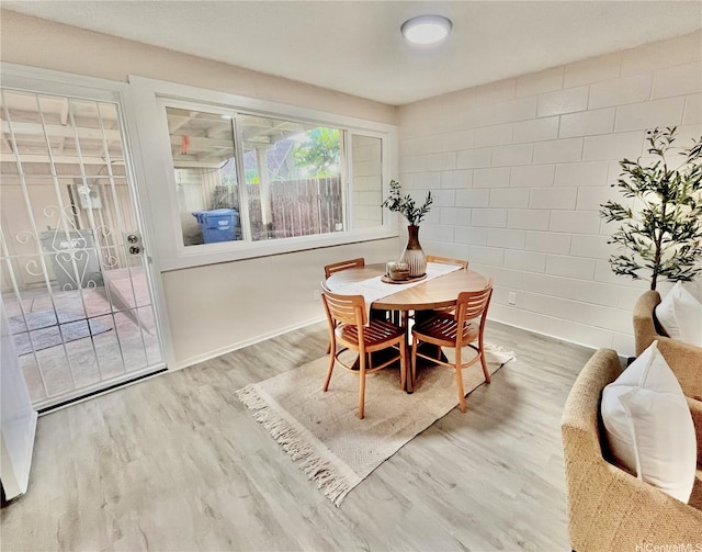 dining area featuring wood finished floors