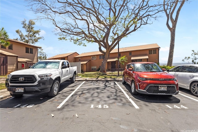 92-1327 Panana St Unit 49, Kapolei, HI 96707 - view of front facade featuring uncovered parking