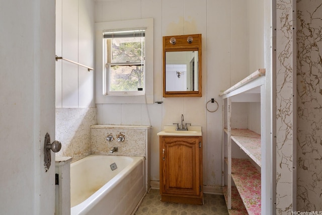 full bath with a bath and vanity