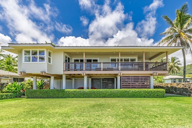 53-926 Kamehameha Hwy, Hauula, HI 96717 - rear view of house featuring a yard, a deck, and stucco siding