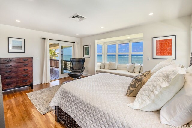 53-926 Kamehameha Hwy, Hauula, HI 96717 - bedroom with visible vents, recessed lighting, wood finished floors, and access to outside