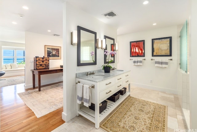 53-926 Kamehameha Hwy, Hauula, HI 96717 - hallway with visible vents, a sink, baseboards, and recessed lighting