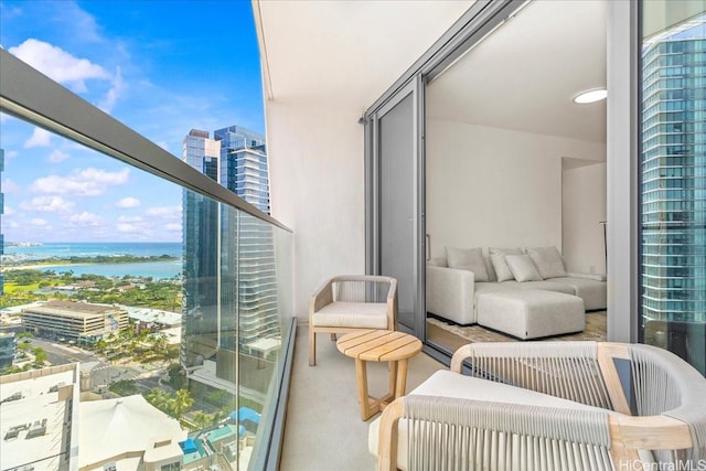 1000 Auahi St Unit 2410, Honolulu, HI 96814 - balcony with an outdoor hangout area, a water view, and a view of city