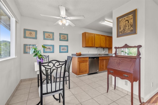 103 Kahako St Unit A, Kailua, HI 96734 - kitchen featuring stainless steel dishwasher, brown cabinetry, a ceiling fan, light countertops, and a textured ceiling