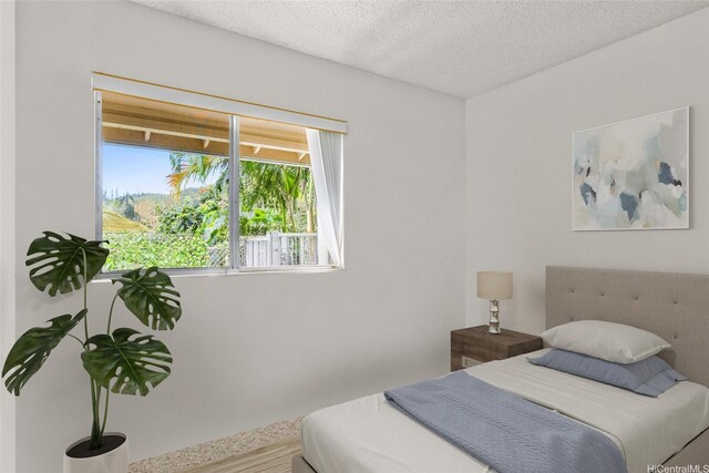 103 Kahako St Unit A, Kailua, HI 96734 - bedroom featuring a textured ceiling