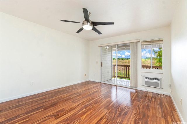 94-608 Lumiaina St Unit S201, Waipahu, HI 96797 - unfurnished room featuring baseboards, an AC wall unit, a ceiling fan, and wood finished floors