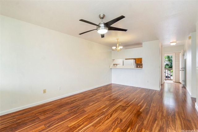94-608 Lumiaina St Unit S201, Waipahu, HI 96797 - unfurnished living room featuring baseboards, ceiling fan with notable chandelier, and dark wood-type flooring