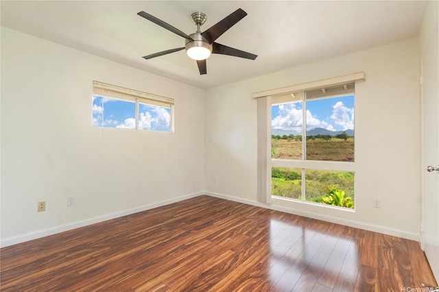 94-608 Lumiaina St Unit S201, Waipahu, HI 96797 - empty room featuring baseboards, a ceiling fan, and wood-type flooring