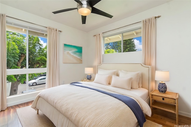 94-608 Lumiaina St Unit S201, Waipahu, HI 96797 - bedroom with baseboards, a ceiling fan, and wood finished floors
