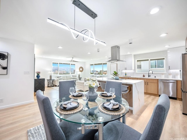 1129 Ala Aloalo St, Honolulu, HI 96818 - dining room featuring baseboards, a ceiling fan, light wood-style floors, and recessed lighting