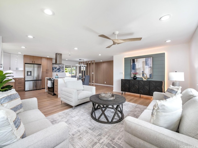 1129 Ala Aloalo St, Honolulu, HI 96818 - living room featuring a ceiling fan, light wood finished floors, and recessed lighting