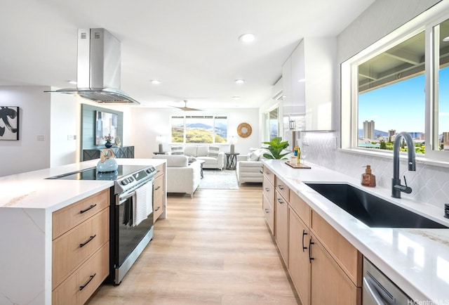 1129 Ala Aloalo St, Honolulu, HI 96818 - kitchen with a sink, island range hood, light brown cabinetry, stainless steel appliances, and light wood finished floors