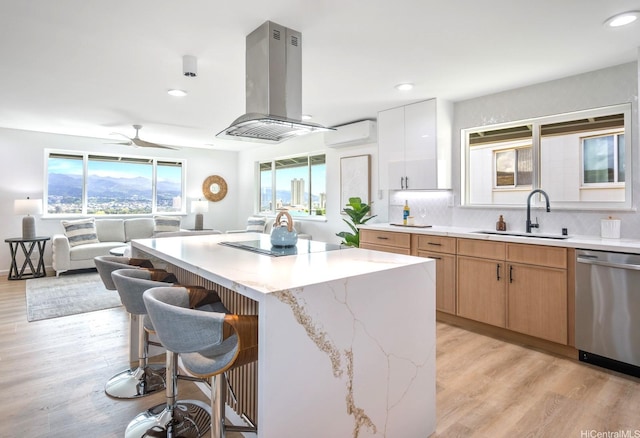 1129 Ala Aloalo St, Honolulu, HI 96818 - kitchen with a sink, stovetop with downdraft, island exhaust hood, dishwasher, and a wall unit AC
