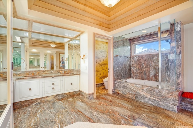 4504 Kahala Ave, Honolulu, HI 96816 - full bathroom with double vanity, a tub with marble appearance, a sink, toilet, and marble finish floor