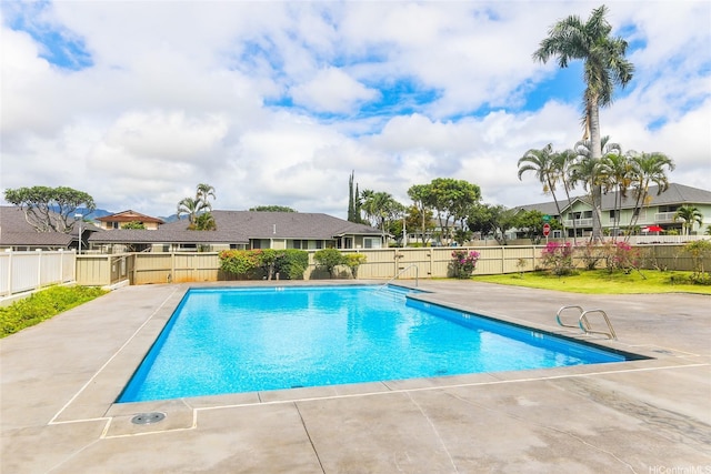 view of swimming pool with fence, a patio area, and a fenced in pool