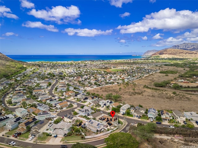 aerial view featuring a residential view and a water view