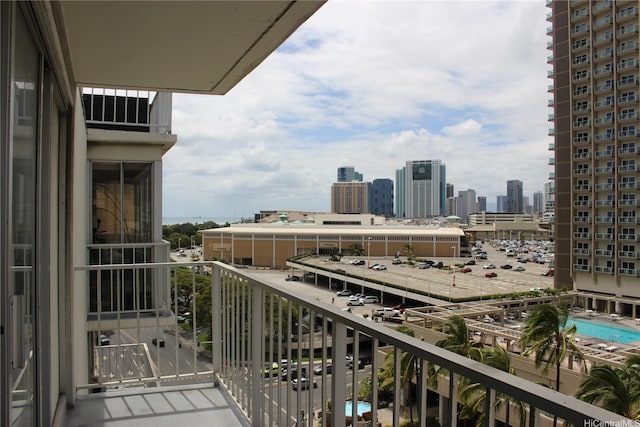 balcony featuring a city view
