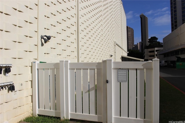view of gate with fence
