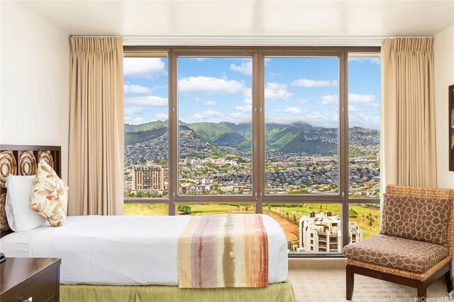 229 Paoakalani Ave Unit 3801, Honolulu, HI 96815 - bedroom with a mountain view and multiple windows