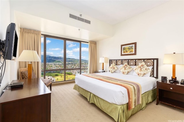 229 Paoakalani Ave Unit 3801, Honolulu, HI 96815 - bedroom with visible vents and light colored carpet