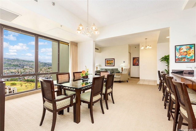 229 Paoakalani Ave Unit 3801, Honolulu, HI 96815 - dining space featuring light carpet, expansive windows, visible vents, and an inviting chandelier