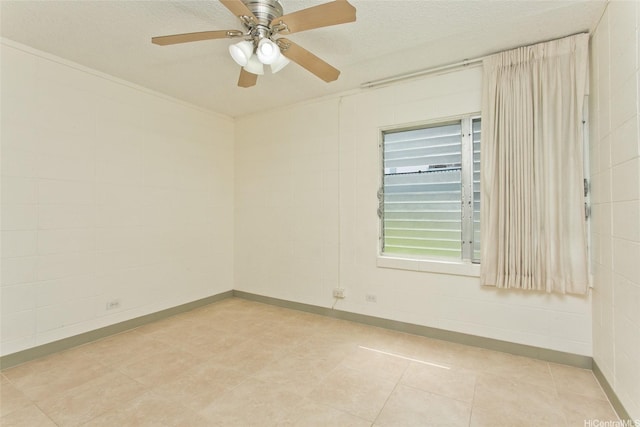 45-535 Luluku Rd Unit G2, Kaneohe, HI 96744 - spare room with a ceiling fan, a textured ceiling, and baseboards