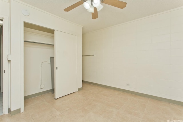 45-535 Luluku Rd Unit G2, Kaneohe, HI 96744 - unfurnished bedroom featuring a ceiling fan, a closet, light tile patterned floors, and baseboards