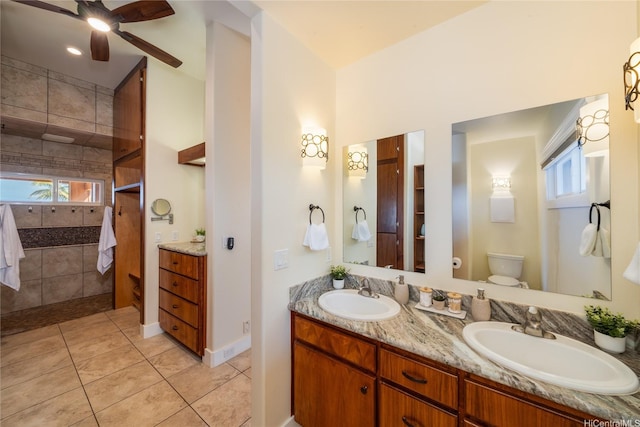 133 Kaula Ili Way, Maunaloa, HI 96770 - bathroom with tile patterned flooring, ceiling fan, a sink, and double vanity