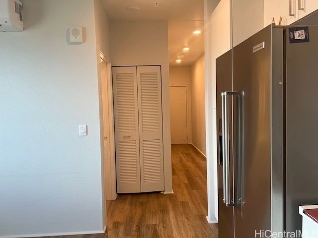 91-3575 Iwikuamoo St Unit 509, Ewa Beach, HI 96706 - hall with wood finished floors