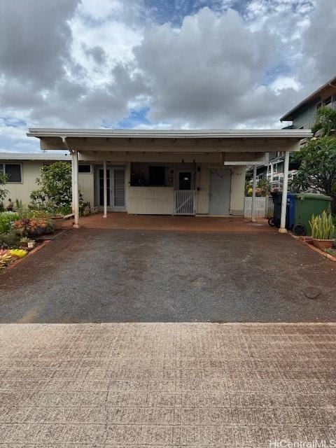 94-440 Kiau Pl, Waipahu, HI 96797 - view of front of property featuring driveway and an attached carport