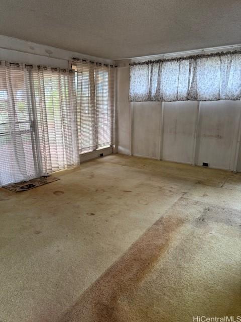 94-440 Kiau Pl, Waipahu, HI 96797 - unfurnished room with carpet flooring
