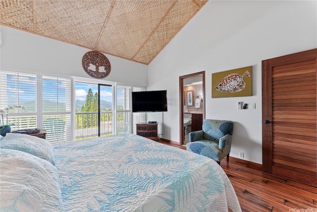 411 Kaelepulu Dr Unit E, Kailua, HI 96734 - bedroom with high vaulted ceiling, hardwood / wood-style floors, baseboards, and ensuite bathroom