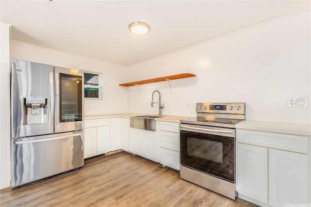 1182 Lauloa St, Kailua, HI 96734 - kitchen featuring open shelves, light wood-style floors, light countertops, a sink, and stainless steel appliances