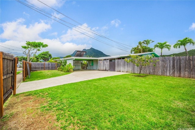 1182 Lauloa St, Kailua, HI 96734 - view of yard featuring a fenced backyard and a patio area