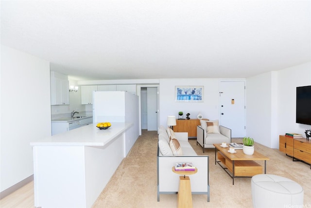 living area with light colored carpet