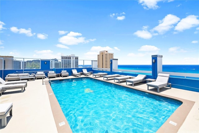 2427 Kuhio Ave Unit 2205, Honolulu, HI 96815 - pool featuring outdoor lounge area and a water view