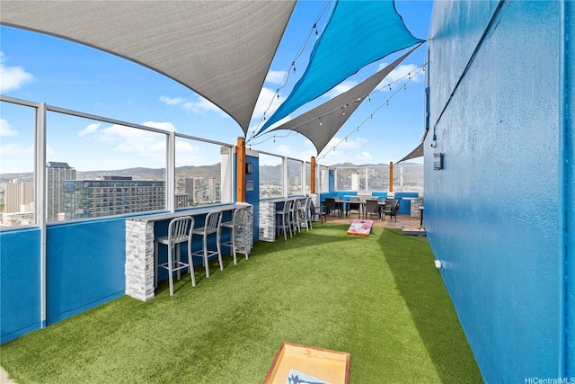 2427 Kuhio Ave Unit 2205, Honolulu, HI 96815 - view of yard featuring outdoor dry bar and a patio area