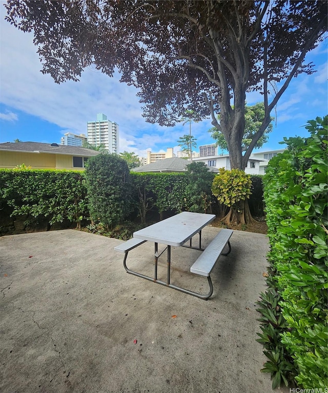 view of patio featuring outdoor dining area
