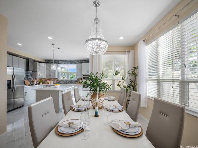 91-1075 Lanakoi St, Kapolei, HI 96707 - dining space with light marble finish flooring, a chandelier, and recessed lighting