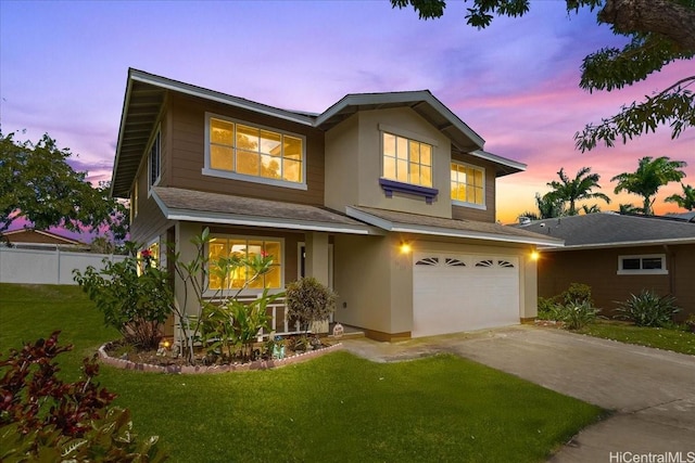 94-513 Kaikua Pl, Waipahu, HI 96797 - traditional-style home featuring driveway, a garage, fence, a front lawn, and stucco siding