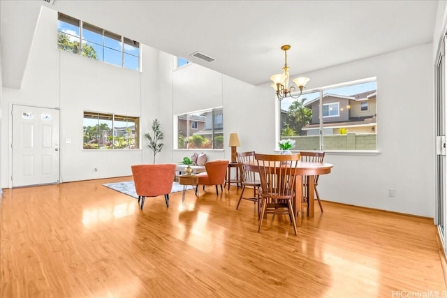 94-513 Kaikua Pl, Waipahu, HI 96797 - dining space with a healthy amount of sunlight, wood finished floors, and visible vents