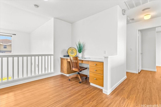 94-513 Kaikua Pl, Waipahu, HI 96797 - office space featuring visible vents, light wood finished floors, built in desk, and baseboards