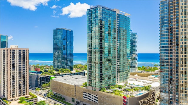 property's view of city featuring a water view