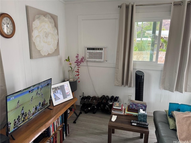 living area with wood finished floors