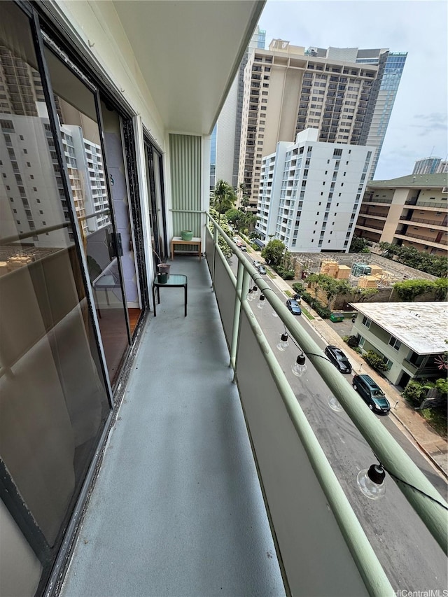 balcony featuring a city view