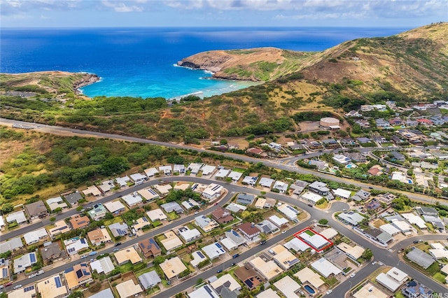 birds eye view of property featuring a residential view and a water view